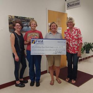 Pictured from left are First National Bank’s Rebecca Miller, Boothbay Region Health Center Board President Patricia Seybold, Board of Directors member Stephanie Hawke and First National Bank’s VP, Branch Manager Brenda Blackman presenting a check from First National Bank. Courtesy photo