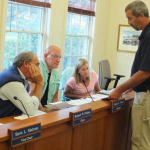 Code Enforcement Officer Jason Lorrain assists appeals board members during an application review on Aug. 26 regarding a home expansion request to add a deck to a Murray Hill Road property. BILL PEARSON/Boothbay Register