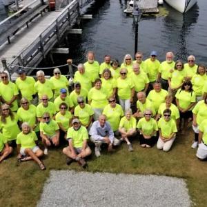 Attendees of the 17th Biennial Maine Island Packet Rendezvous hosted by Norm and Mary Pierce of Pierce Yacht Company gather outside at Captain Fish’s Waterfront Inn in Boothbay Harbor. Courtesy of Norm Pierce
