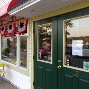The Oak Street Café in Boothby Harbor displays the first decal awarded by the PFP for excellence in reducing the use of plastic straws and of other plastic or Styrofoam products. Courtesy of PFP