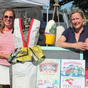 At the Boothbay Farmers’ Market Sept. 5. Lorie Reynolds, left, and Dana Paolillo promote Boothbay Harbor Fest’s last weekend. BILL PEARSON/Boothbay Register