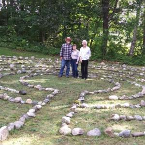 Thom Sikes, Sue Sikes, center, and Rev. Kate Pinkham stand in the center of the labyrinth they created at Edgecomb Community Church. JANE CARPENTER/Boothbay Register