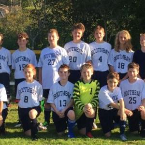 For the first time, Boothbay Region Elementary School is competing as a co-ed soccer team. Pictured from left, front row: Sam Markowitz, Harrison Hinckley, Alosha Sulyandziga, Mackenzie Neumann, Cleyton Splaine, Aiden Sanborn, Sawyer Blake, Owen Cotta, Jordan Chamness, Anna Gosselin; back row: Chase Mansfield, Hannah Abello, Anya Sulyandziga, Duncan Hardwick, Neal Baldwin, Colby Allen, Finn Harkins, Liam Jacobs, Nestor Powers and Coach David Lassen. JOSEPH CHARPENTIER/Boothbay Register