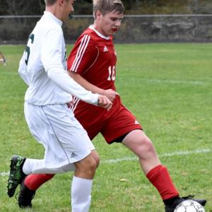 Josh Jones has a busy day in the Wiscasset/Boothbay backfield. PHIL DI VECE/Wiscasset Newspaper
