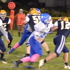 Boothbay quarterback Hunter Crocker avoids the rush Oct. 4 in the Seahawks’ 36-0 homecoming victory over Sacopee Valley. BILL PEARSON/Boothbay Register