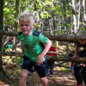 Guz Bezon heads for the finish in the obstacle course. Jess Ruhlin photo