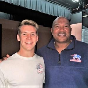 Hunter Crocker, a captain on the Boothbay Region High School football team, learns about becoming a youth mentor from former New England Patriots football player Garin Veris. Courtesy of BBBSMM
