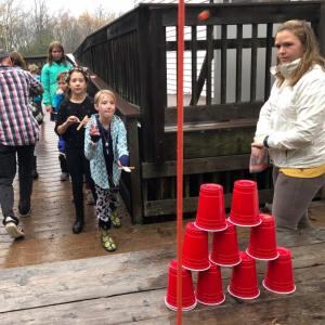 Stella Stevens goes for glory at the Tower Topple, one of six challenges at the Pumpkin Catapult Olympic Games. JENNY BENNETT/Boothbay Register