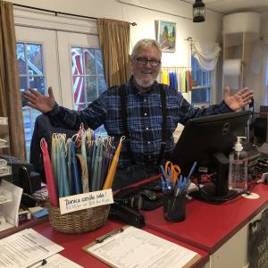 Mike Elkins, happy behind his new counter! JENNY BENNETT/Boothbay Register