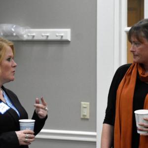 Town manager candidate Julia Latter, left, speaks with select board vice chair Tricia Warren. JOSEPH CHARPENTIER/Boothbay Register