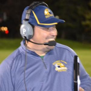 Boothbay Coach Ed Crocker is all smiles as his team enters its last regular season game atop the eight-man football small conference standings. BILL PEARSON/Boothbay Register