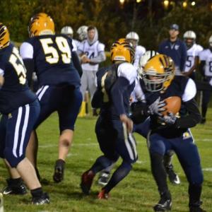 Boothbay tries a little razzle dazzle Oct. 11 by running a first quarter reverse in its 50-20 loss to Yarmouth. BILL PEARSON/Boothbay Register
