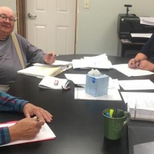On Oct. 7, Boothbay Harbor Sewer District trustees began workshops on the 2020 budget. Clockwise from left are trustees Daryl Kipp and Jim Stormont, district superintendent Chris Higgins, and trustee Sam Morris. BILL PEARSON/Boothbay Register