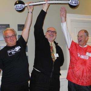 United Way campaign director Tom Blatz of Wiscasset , left, board chair Bill Brillant, center, and campaign chair Steve Bailey have fun with United Way’s campaign theme this year: “People Power for Local Change” Courtesy of Barbara Reinertsen