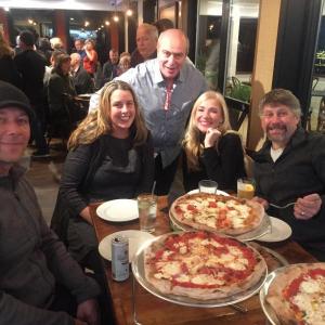 Ports Pizzeria co-owner Sante Callandri greets patrons Nov. 10, from left, Chris Fritz, Allison Evans, Cathi Bertins and Chris Bertins during the shop’s “soft”
opening. BILL PEARSON/Boothbay Register