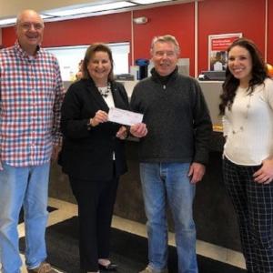 Present at the donation presentation at Key Bank are, from left, Ken F-Fitch, BHWP board member, Beth Lord, Key Bank branch manager, Bob McKay, BHWP president, and Reeva Wyman, Key Bank employee. Courtesy photo