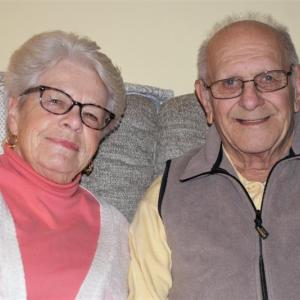 Sue and Bill Burge enjoy a quiet moment at their Boothbay home. Sue says the LincolnHealth Palliative Care program has “taken a burden off her heart” as she cares for her husband. Courtesy of LincolnHealth