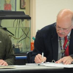 Edgecomb School Committee Chairman Tom Abello, left, asked AOS Superintendent Keith Laser Dec. 9 about the CSD’s Master Plan. BILL PEARSON/Boothbay Register