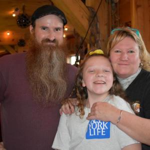 Emcee Darrell Gudroe, fundraiser founder Suzie Edwards, and Brady’s owner Jen Mitchell are all smiles at the very successful Fill the Boat With Love event at Brady’s Dec. 29. LISA KRISTOFF/Boothbay Register
