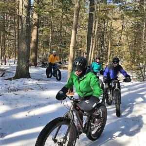 Fat tire biking in the snow at Hidden Valley Nature Center. Courtesy of Midcoast Conservancy