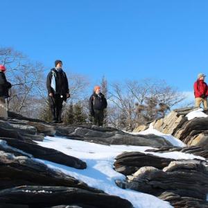 Hikers look out over Muscongus Bay at La Verna Preserve. Courtesy of Coastal Rivers