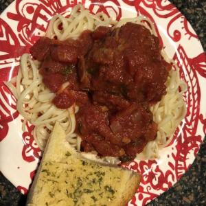 Tuscan meatballs with marinara sauce and spaghetti and a slice of garlic bread. Lisa Orne Hallinan photo