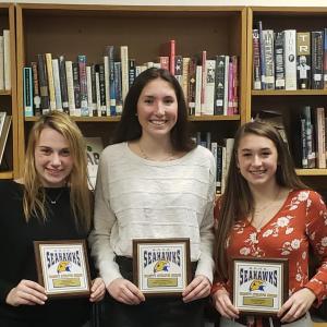Holding plaques they received at the BRHS girls basketball awards ceremony March 2 are, from left, Kylie Brown, most improved player; Glory Blethen, most valuable player; and Chloe Arsenault, coach’s award. Courtesy of Brian Blethen