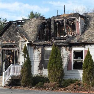 This Sunny Acres Lane home was a total loss following a March 5 midnight blaze. The home is owned by Justin Clark and his fiancé Naomi Mackin. The couple escaped without injury, but a cat and two dogs died. BILL PEARSON/Boothbay Register