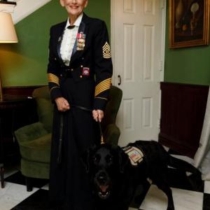 Gretchen Evans, United States Army (Ret.), with her hearing service dog, Aura. Courtesy photo