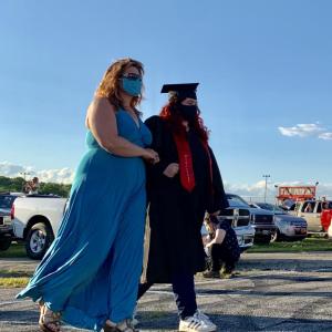 Wiscasset School Committee’s Desiree Bailey escorts daughter Gabrianna Bailey to “Pomp and Circumstance” at Wiscasset Speedway June 12. SUSAN JOHNS/Wiscasset Newspaper