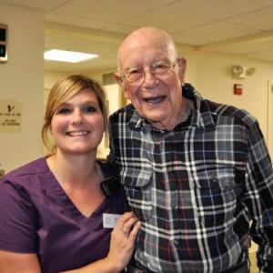 Kacie Gallant with resident, Phil Cameron. Kim Traina photo