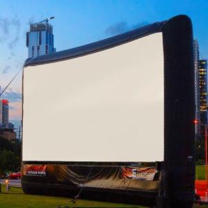 A 17-foot x 30-foot pop-up screen with enhanced sound for outdoor film viewing! Courtesy of Helen Meserve
