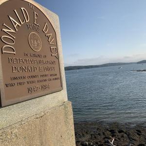 The low late day sun shines Saturday, Sept. 26 on the plaque honoring the Wiscasset to Edgecomb bridge’s namesake. SUSAN JOHNS/Wiscasset Newspaper