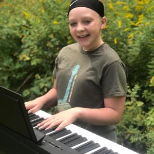 Suzie Edwards and her brand new electric piano. STEVE EDWARDS/Boothbay Register