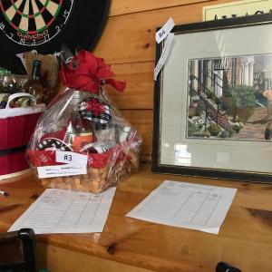Some of the items in a benefit silent auction at Cubbyhole Sports Pub in Wiscasset. Courtesy photo