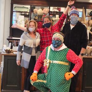 Ae Ceramics had a line waiting at the door before a 5 a.m., Nov. 14 start to the 32nd Early Bird Sale. Pictured, front, Mike Maxim. Back, from left, Lisa Best, Allison Evans and Chris Fritz. BILL PEARSON/Boothbay Register