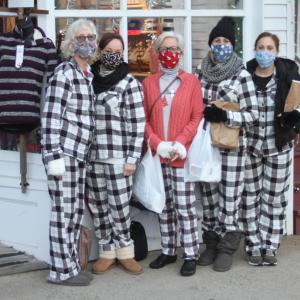 These Early Birds in their matching pajamas are finding some wonderful deals. STEVE EDWARDS/Boothbay Register