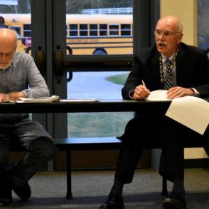 Dr. Keith Laser, right, with AOS 98 Chair John Bertolet in a meeting last fall. File photo