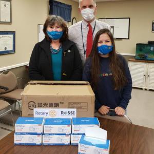 Pictured are, from left, Rotary Club president Irene Fowle, Superintendent of Schools Keith Laser, and Interact Club president Emerson Harris. Courtesy photo
