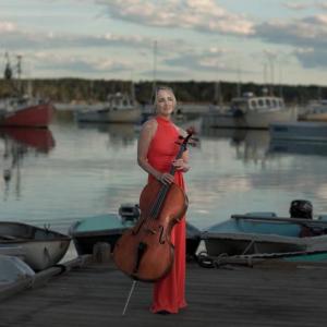 Wilhelmina Smith, Salt Bay Chamberfest’s artistic director and cellist, performed on a float in New Harbor for a newly released video, one of several created to connect with audiences. Joe Zizzo photo