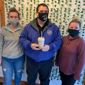 Ed Crocker is one of the many satisfied customers buying sports drinks and protein shakes at Harbor Nutrition in Boothbay. The store is owned by Kimberly Gordon, left, and Paige McLellan. BILL PEARSON/Boothbay Register