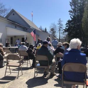 Residents prepare for the socially distant, outside public meeting at Southport Town Hall April 10. JENNY BENNETT/Boothbay Register