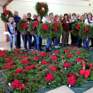Boothbay Region Garden Club members and the wreaths they decorated. Courtesy photo
