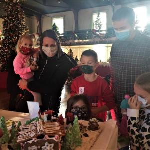 The Light family of Bangor also came to see Santa at Boothbay Railway Village and take in Gardens Aglow on Sunday. From left, Greta, Aimiee, Judah, Veda, Joe and Marina. LISA KRISTOFF/Boothbay Register