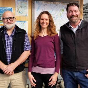 Pictured are Luther Black, Midcoast Conservancy Land Protection Specialist Anna Fiedler, and Executive Director Pete Nichols; Black gifted the Goose River Woodland Preserve in honor of his family. Courtesy of Midcoast Conservancy