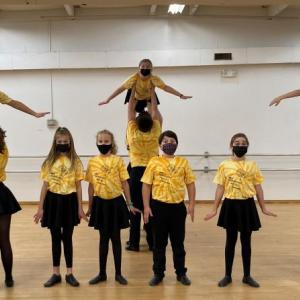 These 19 Y Arts performers, competing in the iTheatrics Junior Theater Festival the weekend of Jan 14, rehearse a number from “Madagascar Jr.” Emily Mirabile photo
