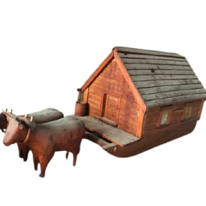 Lincoln County Historical Association’s collections include a carved replica of the family cabin drawn by oxen which is the subject of Coatsworth’s book “Away Goes Sally.” Courtesy of LCHA
