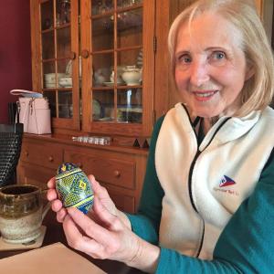 Alina Blakesley designed and painted this Ukrainian Easter egg in blue and yellow symbolizing the Ukrainian flag. LISA KRISTOFF/Boothbay Register