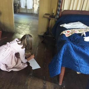 A Summer with the Past participant uses an artifact as inspiration for her art project. Sherrie Holbrook photo