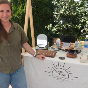 Sari Rae displays her craftsmanship June 30 in the Artist’s Alley show during Windjammer Days. BILL PEARSON/Boothbay Register